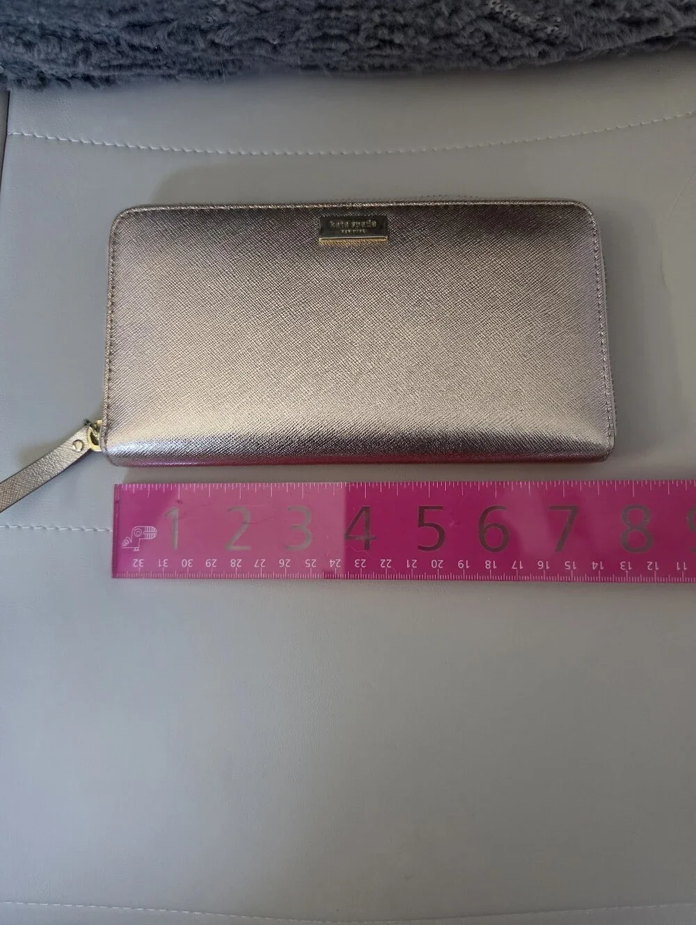 Kate Spade metallic rose wallet in rose gold